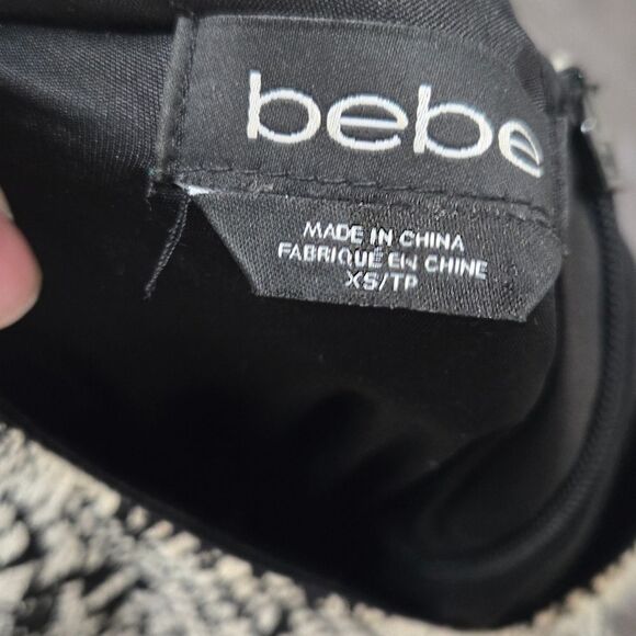 Bebe Womens Size XS Black White Peplum Dress Cap Sleeves Bodycon Fit - Picture 7 of 8